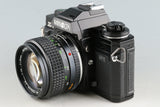 Minolta X-700 + MC Rokkor-PG 50mm F/1.4 Lens #57409D5