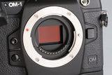 Olympus OM-1 Mirrorless Digital Camera + Power Battery Holder HLD-10 #60338E3