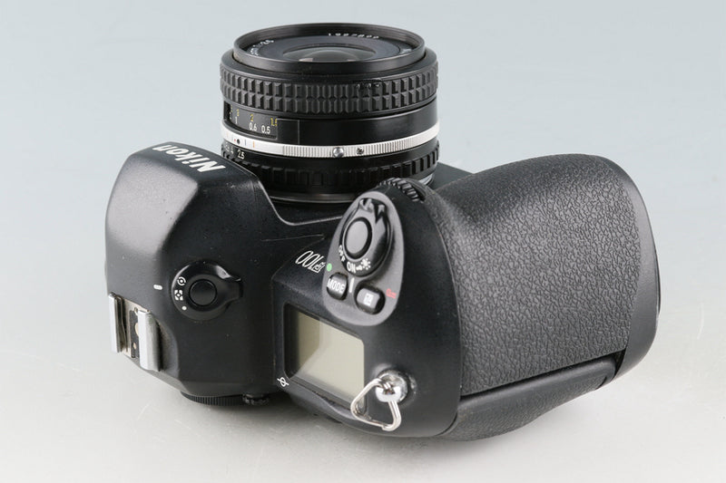 Nikon F100 + SERIES E 35mm F/2.5 Lens #49467F3